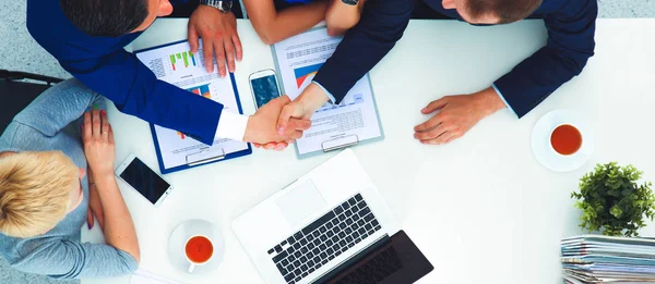 Business people sitting and discussing at business meeting, in office — Stock Photo, Image