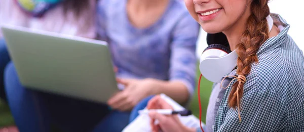 Group of young student using laptop together — Stock Photo, Image