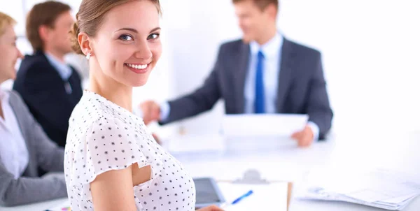 Business people sitting and discussing at business meeting, in office Stock Photo