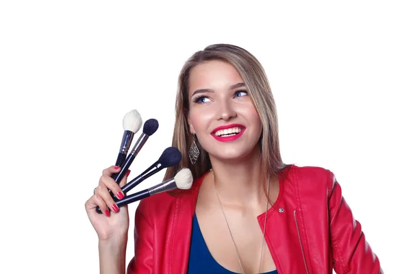 Young beautiful woman holds in hand brush for makeup . — Stock Photo, Image