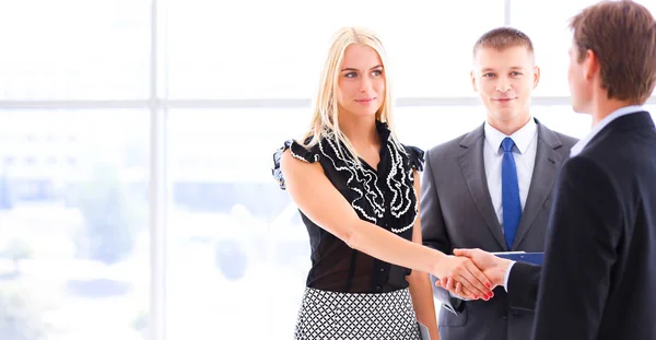 Business people shaking hands after meeting in office — Stock Photo, Image