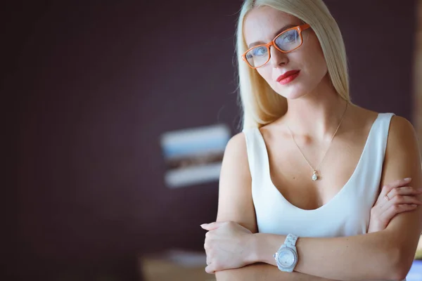 Portrait of an executive professional mature businesswoman sitting on office — Stock Photo, Image