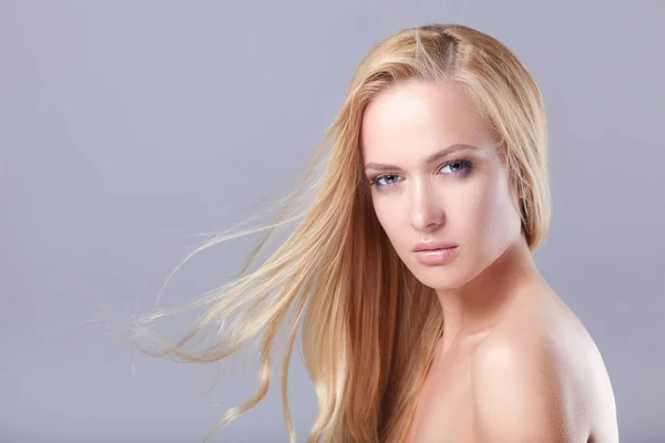 Beauty. Portrait of a young woman on white background — Stock Photo, Image