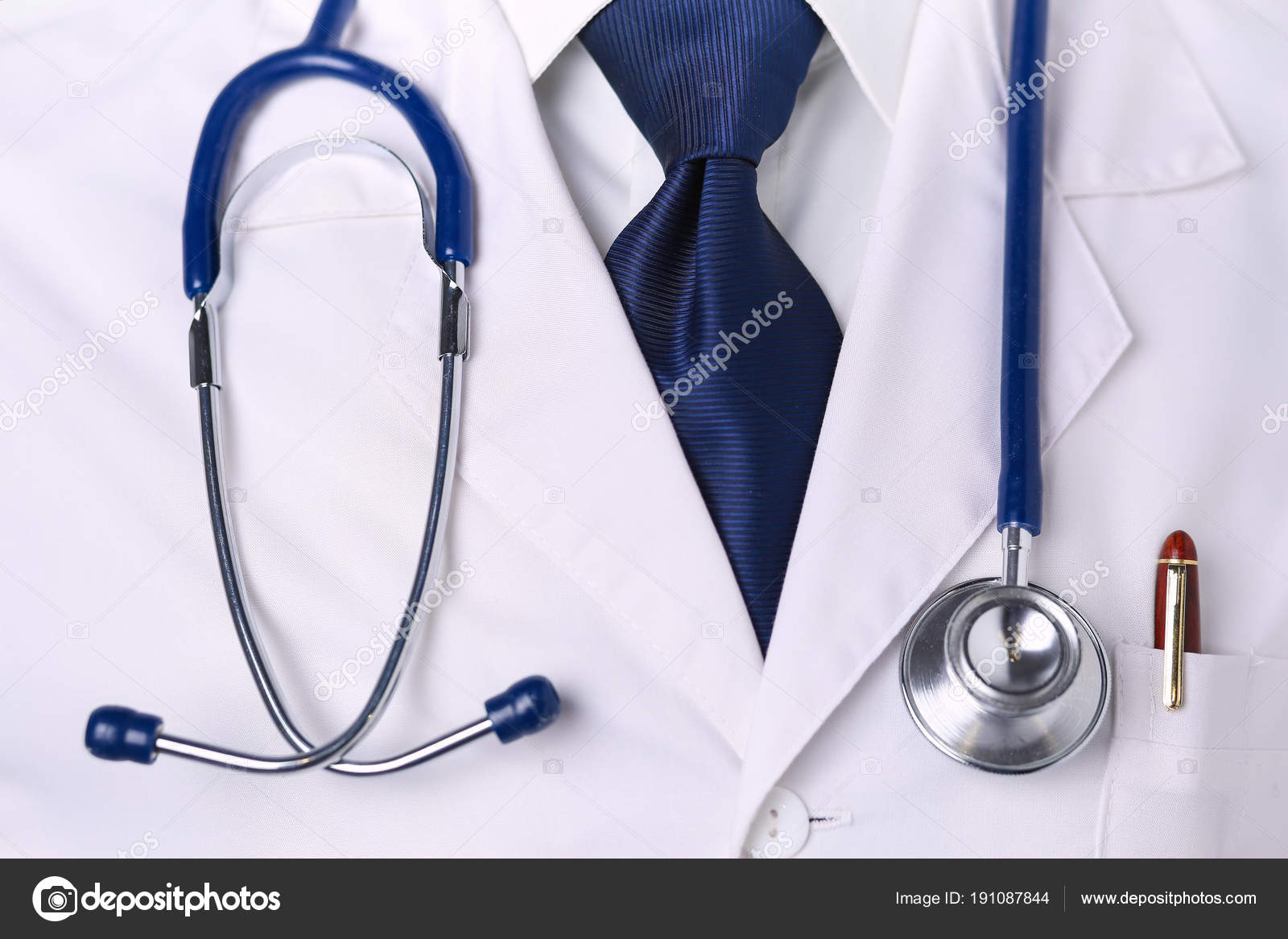 Medical doctor with a stethoscope standing in office Stock Photo by  ©lenetssergey 191087844