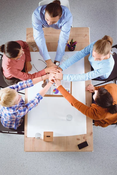 Team work concept. Business people joining hands — Stock Photo, Image