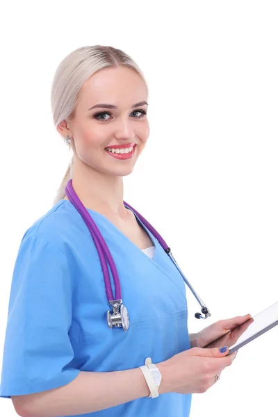 Női orvos egy digitális tabletta és álló fehér háttér. Női orvosok. — Stock Fotó