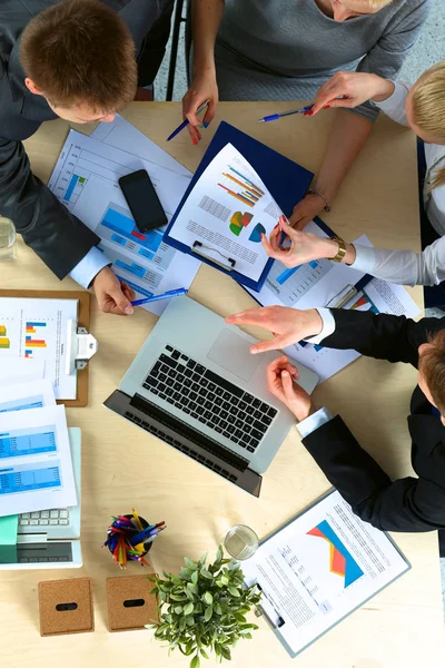 Business people sitting and discussing at business meeting, in office — Stock Photo, Image