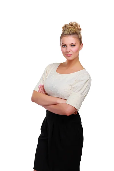 Portrait of a confident young woman standing isolated on white background — Stock Photo, Image