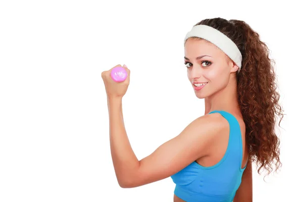 Fitness mujer joven haciendo ejercicio con la mancuerna —  Fotos de Stock