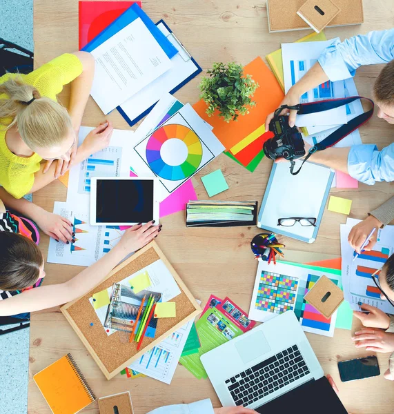 Business people sitting and discussing at business meeting, in office — Stock Photo, Image