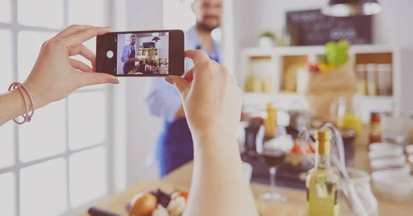 Portrait of handsome man filming cooking show or blog — Stock Photo, Image