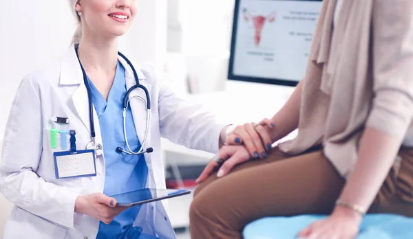 Doctor and patient discussing something while sitting at the table . Medicine and health care concept. Doctor and patient — Stock Photo, Image