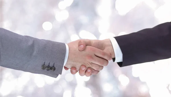 Clouse-up of businessman and businesswoman shaking hands — Stock Photo, Image