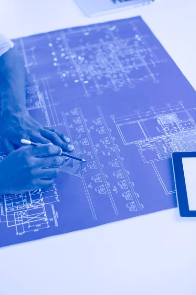 African american architect working with computer and blueprints in office — Stock Photo, Image