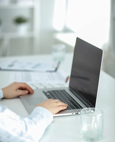 Portrait of office worker man sitting at office desk using laptop computer — Stock Photo, Image