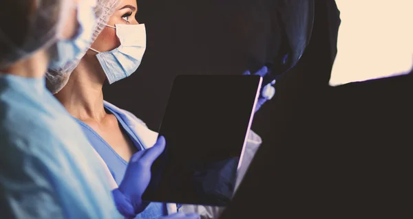 Doctor and patient discussing something while sitting at the table . Medicine and health care concept. Doctor and patient — Stock Photo, Image