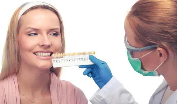 Young woman dentist at work in the office — Stock Photo, Image