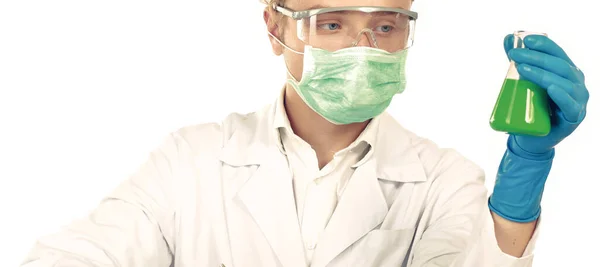 Portrait of pretty female laboratory assistant analyzing a blood sample at hospital — Stock Photo, Image