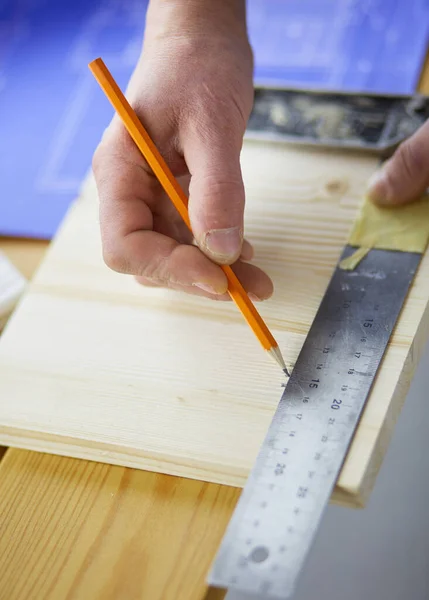 Architect working on drawing table in office — Stock Photo, Image