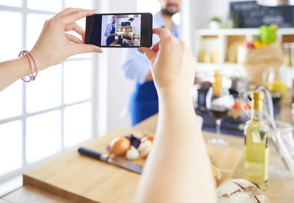 Portrait of handsome man filming cooking show or blog — Stock Photo, Image