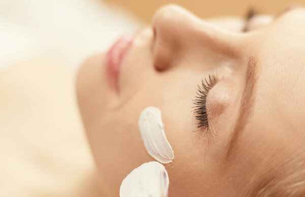 Spa facial mask application. Spa beauty organic facial mask application at day spa salon