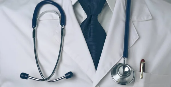 Young and confident male doctor portrait standing in medical office — Stock Photo, Image