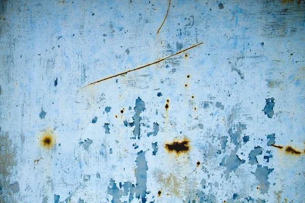 Oude blauwe gepelde en roestige muur achtergrond — Stockfoto