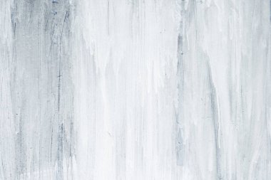 Yüzeyde beyaz ve mavi boya damlıyor, soyut arkaplan 