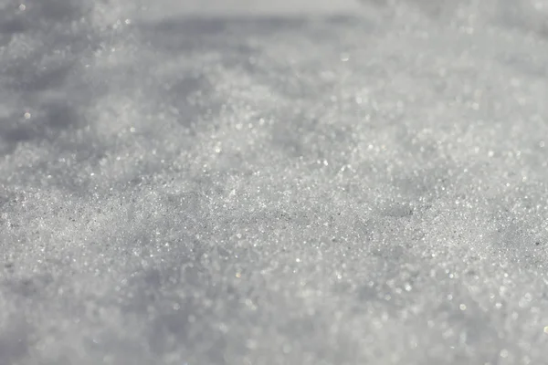 白い雪の背景がクローズアップされ — ストック写真