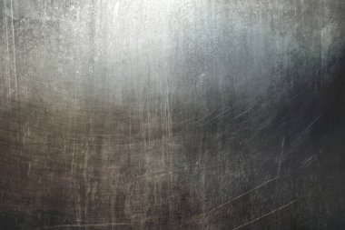 Dağılmış metalik kazınmış duvar dokusu veya arkaplanı 
