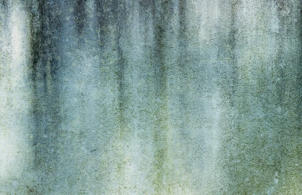 Old blue moldy wall grungy background or texture