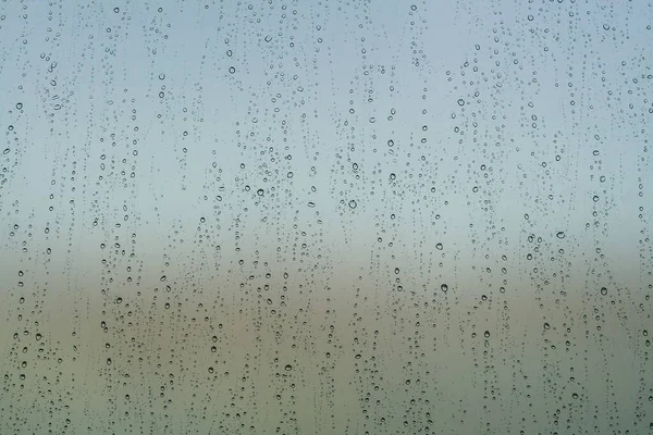 Regentropfen Einem Fenster Blauer Abstrakter Hintergrund — Stockfoto