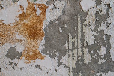 Boya soyan eski duvar.