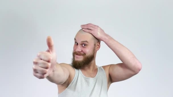 Caucasian Guy Shows Sign Of Like.A bearded man with a bald head smiling. — Stock Video