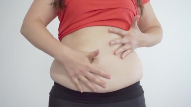 Fat girl chubby hands on his stomach. Cellulite and obesity — Stock Footage Fat girl chubby hands on his stomach. Cellulite and obesity Stock Video