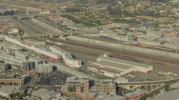 AERIAL: LA River in Los Angeles, California Industry in pretty sunning, blue sky, — стокове відео