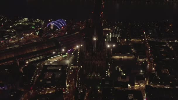 AERIAL: Beautiful Wide Shot over Cologne Germany at Night time with City lights — 图库视频影像