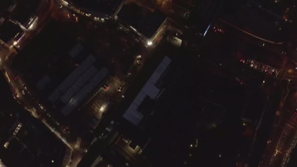 AERIAL: Slow Overhead Shot of City at Night with Lights and Traffic, Кельн, Германия — стоковое видео