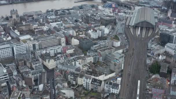 AERIAL: Over Cologne Rail Way Train system with Train driving on Cloudy day — Stock video