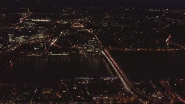 AERIAL: Beautiful Wide Shot over Cologne Germany with River Rhine and Bridge Car traffic and City lights — 图库视频影像