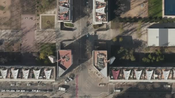 AERIAL: Barcelona Overhead Drone Shot of Typical City Blocks in Beautiful Sunlight with Urban Traffic — Stock Video