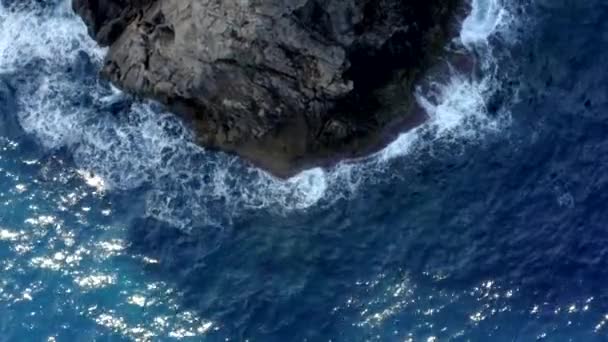AERIAL: Close Up of Cliff on Tropical Island Mallorca, Spain with ocean and Blue water in Summer, Daylight Vacation, Travel, Sunny, Waves — 비디오