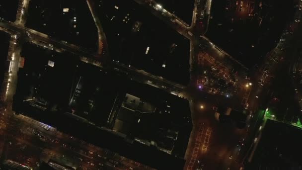 AERIAL: Slow Overhead Shot of City at Night with Lights and Traffic, Кельн, Германия — стоковое видео