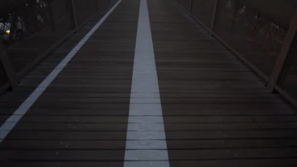 SLOW MOTION: Empty Brooklyn Bridge with no people early morning at sunrise in beautiful sunlight in summer — Stock Video