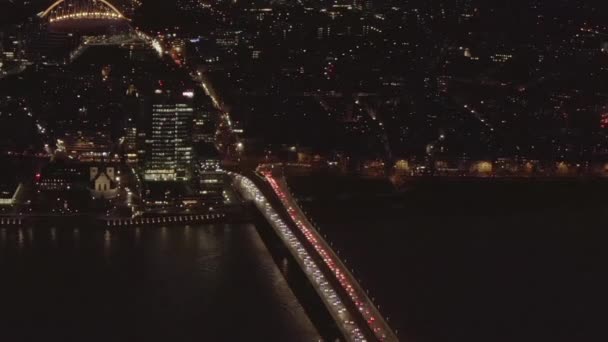 AERIAL: Beautiful Wide Shot over Cologne Germany with River Rhine and Bridge Car traffic and City lights — Stock Video
