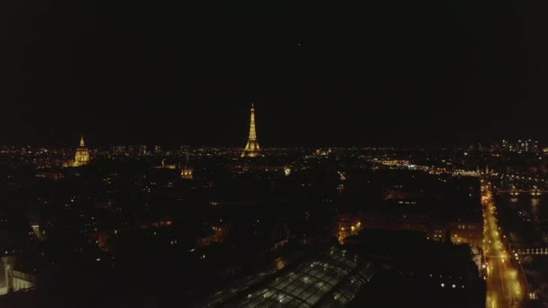 AERIAL: View over Paris, France at Night with View on Eiffel Tower, Tour Eiffel Shining light and Beautiful City Lights — 비디오
