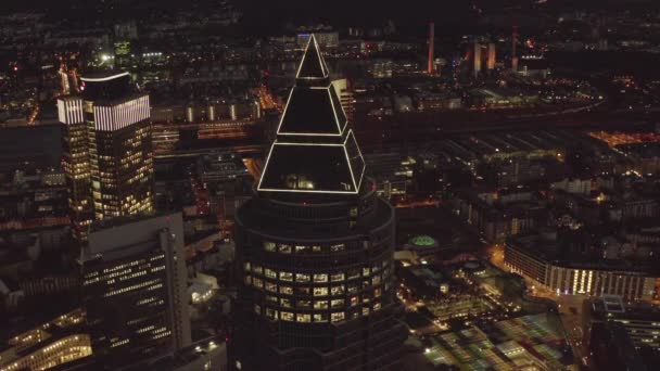 AERIAL: Messeturm in Frankfurt am Main, Germany at Night, Big City, Lights, Skyscraper — Stock Video