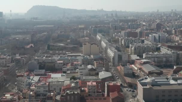 AERIAL: Barcelona Wide Drone of Hazy Cityscape — Vídeos de Stock