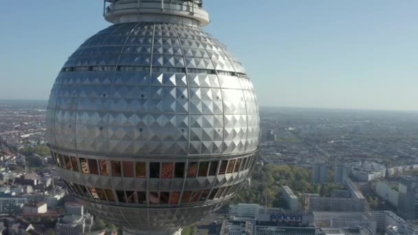 AERIAL: Super Close Up View Circle around the Alexander Platz TV Tower in Berlin, Germany on hot summer day — Stock Video