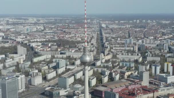 AERIAL: Wide View of Empty Berlin, Germany Alexanderplatz TV Tower with almost No People or Cars on Beautiful Sunny Day During COVID19 Corona Virus Pandemic — Stock Video